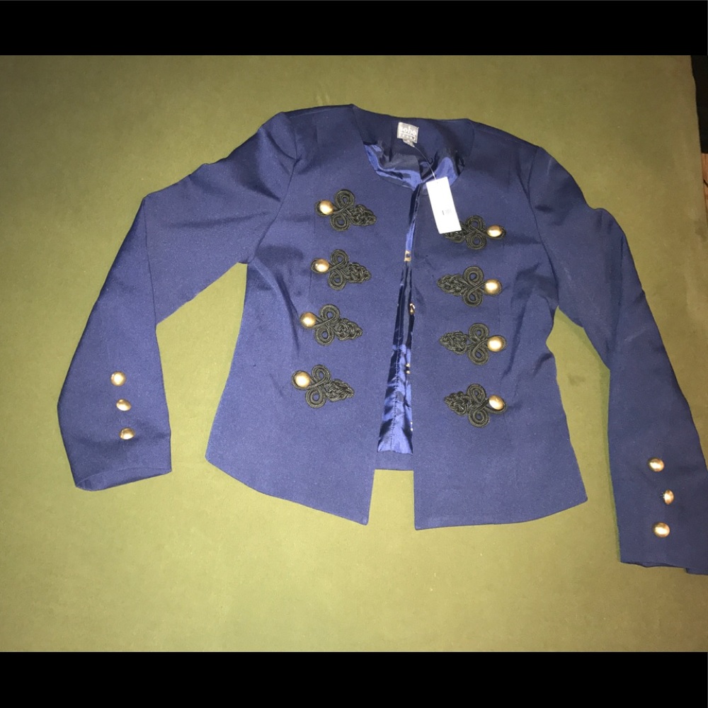 Blue blazer. Black detailing with gold buttons.